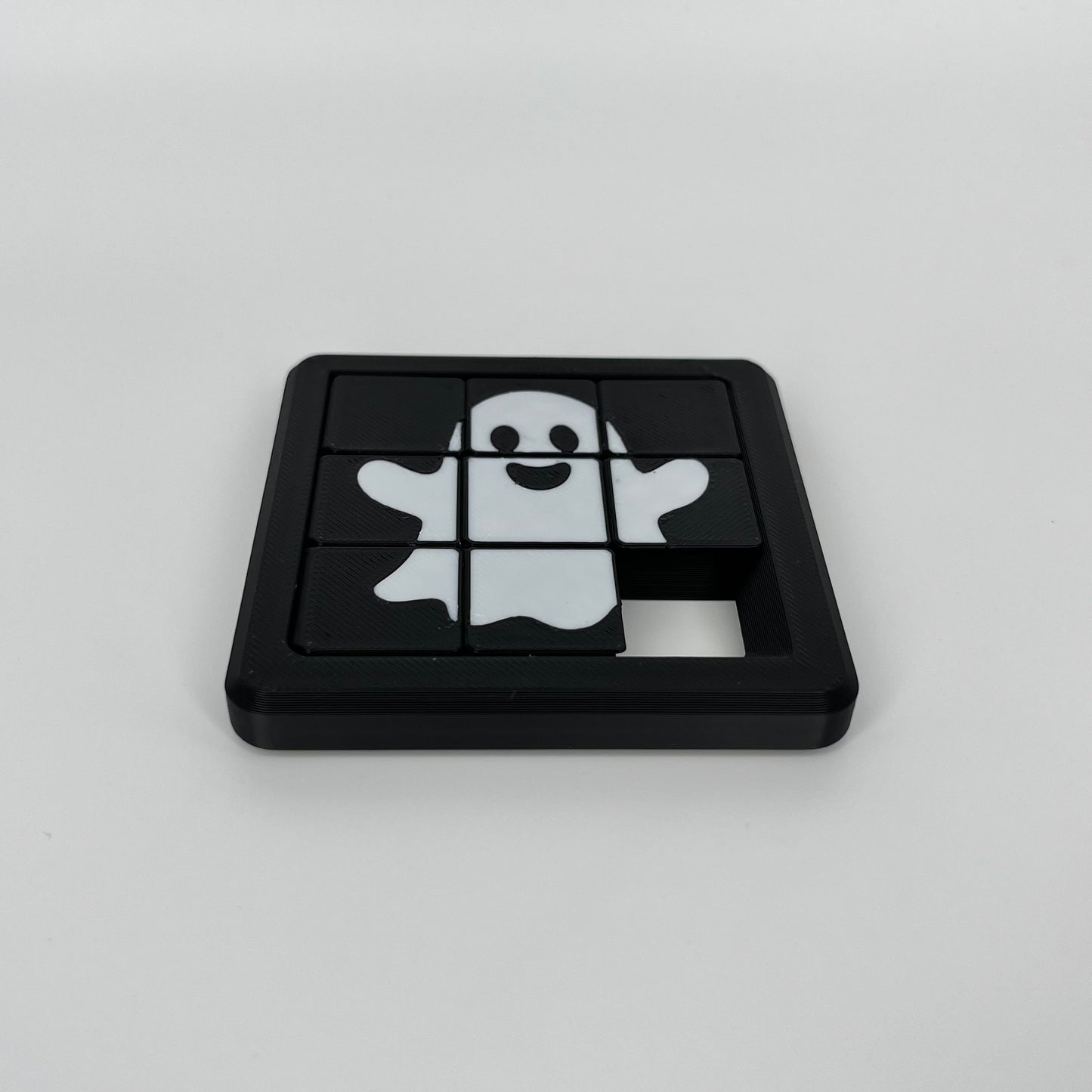 Happy Ghost 8 Sliding Puzzle