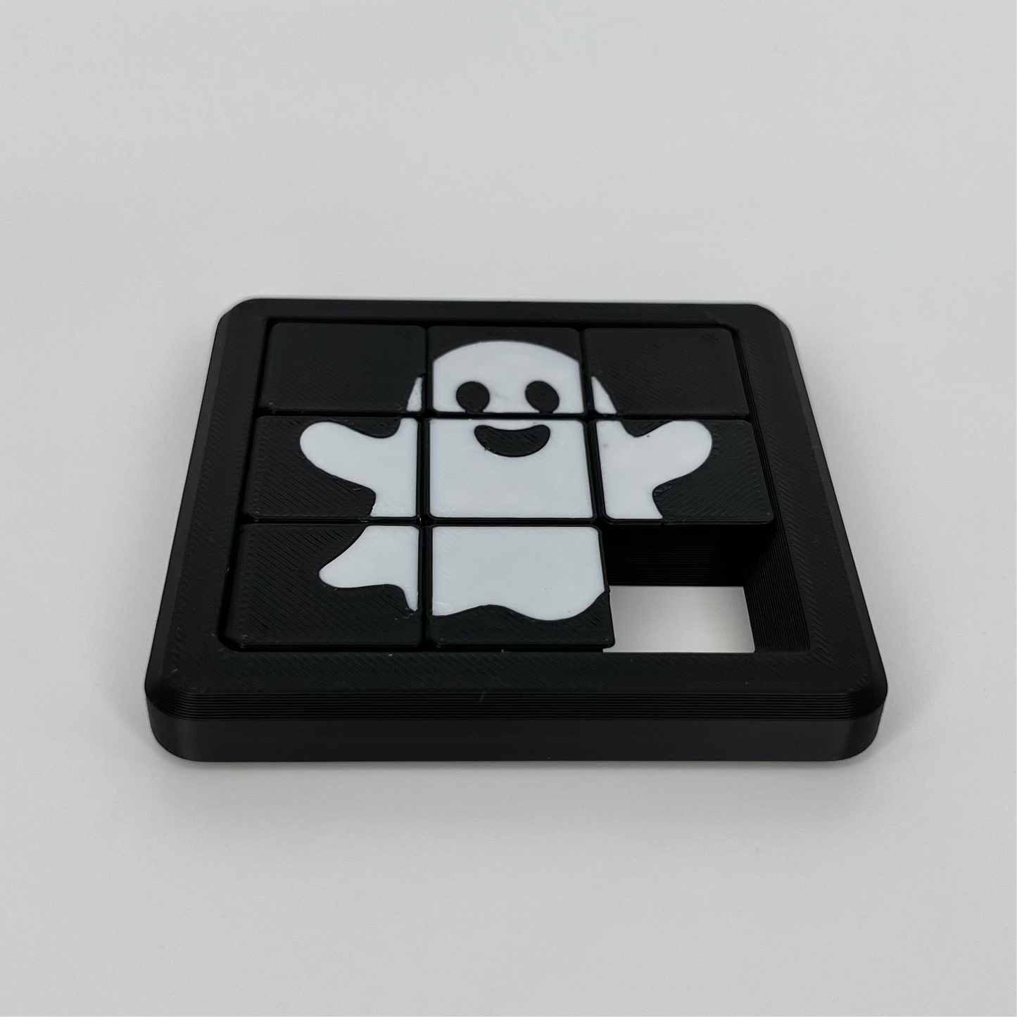 Happy Ghost 8 Sliding Puzzle